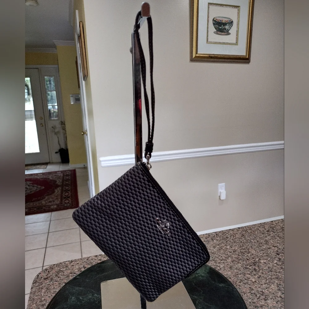 Black and gray checkered Coach Wristlet